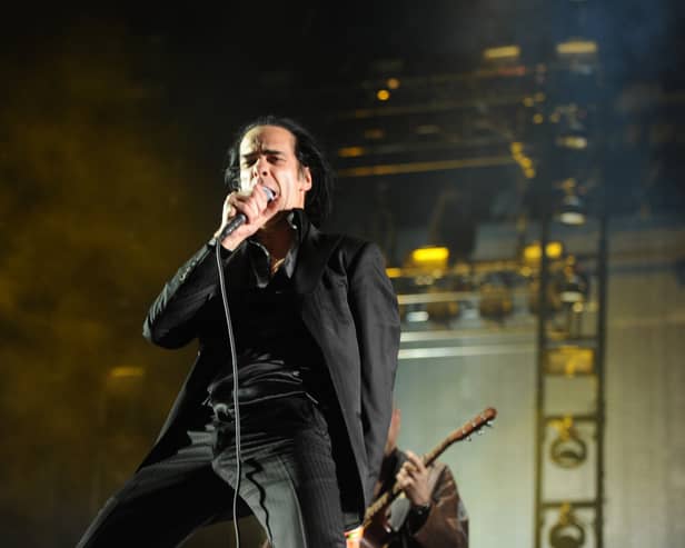 Musician Nick Cave of the band Nick Cave and the Bad Seeds perform onstage during day 3 of the 2013 Coachella Valley Music & Arts Festival