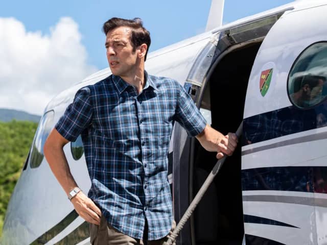 In pictures released by the BBC ahead of the Death in Paradise finale, we see Neville Parker (Ralf Little) boarding a plane at the airport (Photo: BBC)