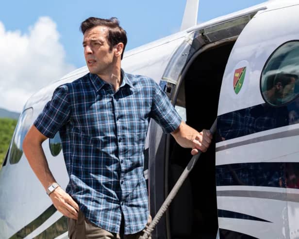 In pictures released by the BBC ahead of the Death in Paradise finale, we see Neville Parker (Ralf Little) boarding a plane at the airport (Photo: BBC)