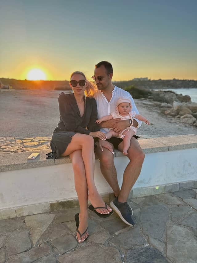 Elizabeth Kenina, 30, with husband Alex, 33, and baby Michelle, eight months, in Mallorca, Spain