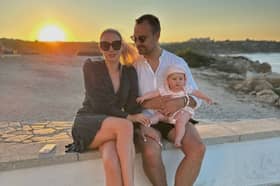 Elizabeth Kenina, 30, with husband Alex, 33, and baby Michelle, eight months, in Mallorca, Spain