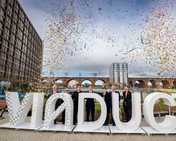 Greater Manchester Mayor Andy Burnham, Stockport council leader Mark Hunter, and others during the opening event at Stockport Interchange. 