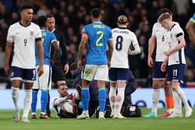 Kyle Walker receiving treatment during England vs Brazil