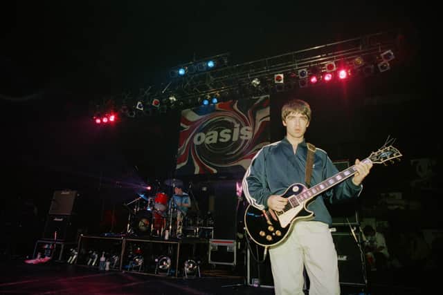 Noel Gallagher of British rock group Oasis live at the Astoria in London, 19th August 1994
