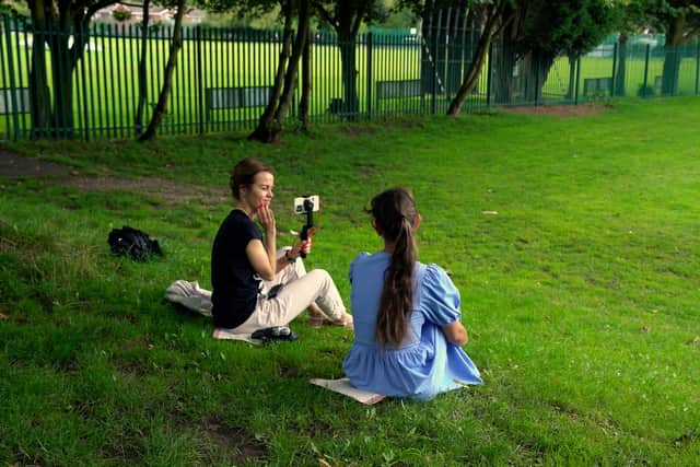 Director Alyona Kaporina shooting her documentary The Rising Sun.