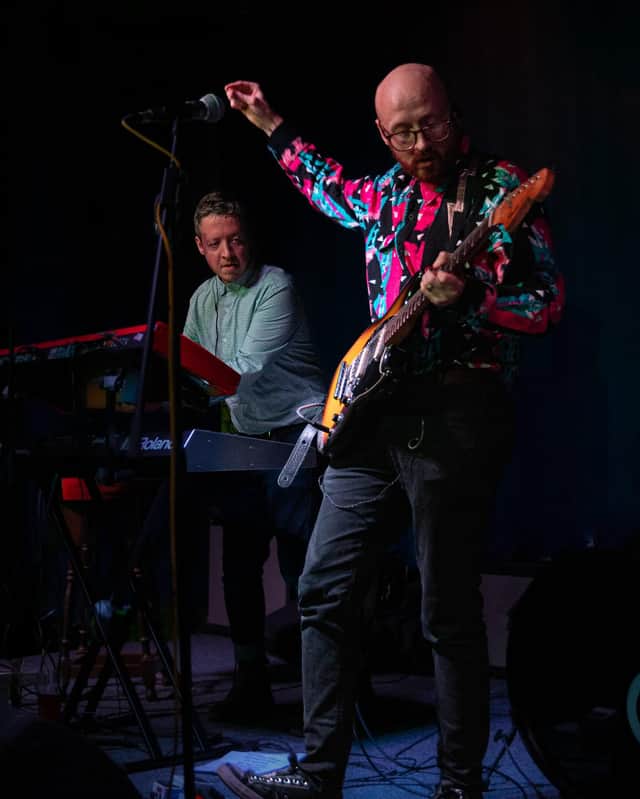 Chris Maddon (right) on stage with Spin Klass in Manchester.