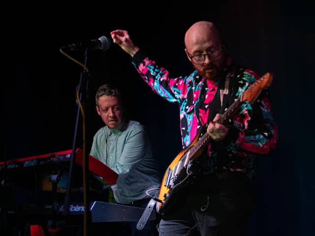 Chris Maddon (left) on stage with Spin Klass in Manchester.