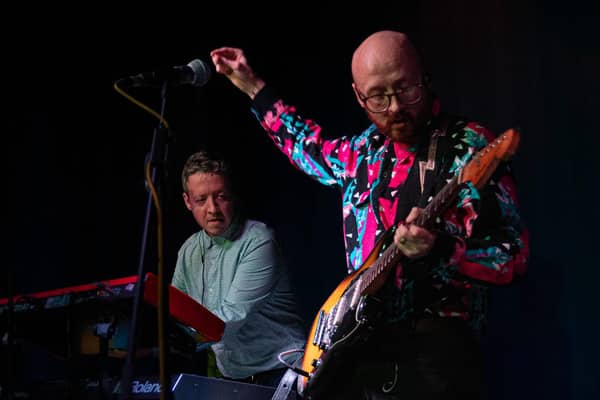 Chris Maddon (left) on stage with Spin Klass in Manchester.