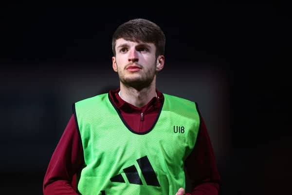Jack Kingdon warms up ahead of the FA Youth Cup match between Swindon Town and Manchester United