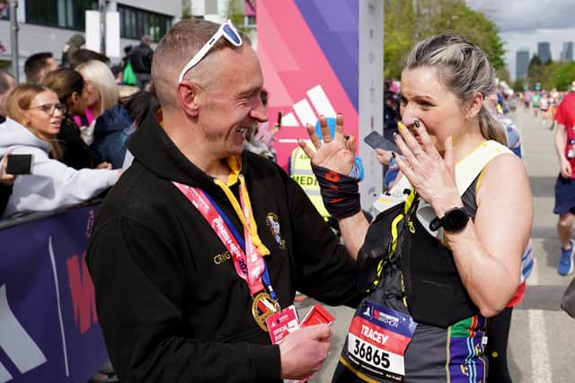 Craig Freestone proposes at the finish line