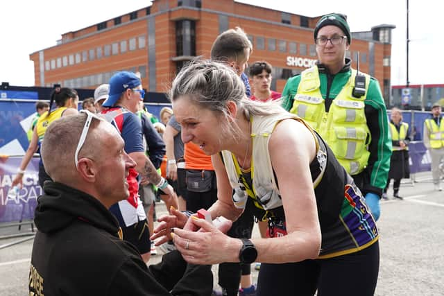  Craig Freestone proposes to partner Tracey at the finish line