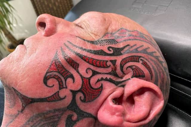 Bodybuilder Ray Houghton's new face tattoo.