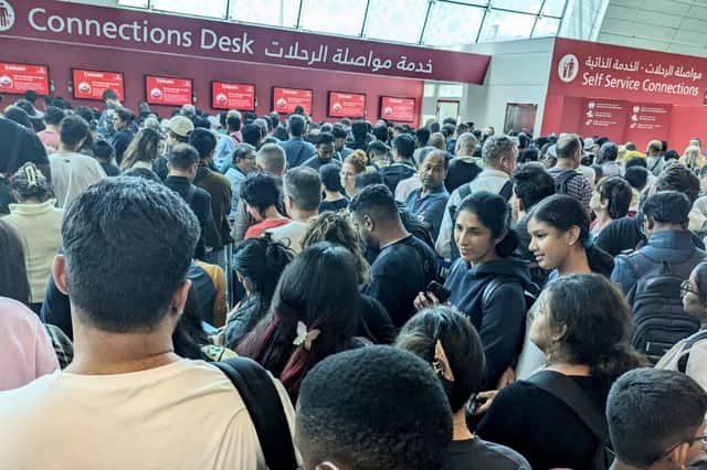 Queues to rebook cancelled flights in Dubai airport. 