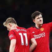 Harry Maguire celebrates his side's fourth goal with Rasmus Hojlund