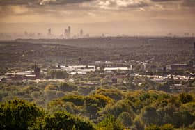 Bolton with Manchester looming large in the distance 