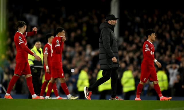 Manchester City's title rivals Liverpool slipped to a costly Merseyside derby defeat