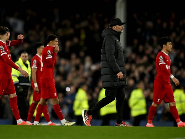 Manchester City's title rivals Liverpool slipped to a costly Merseyside derby defeat