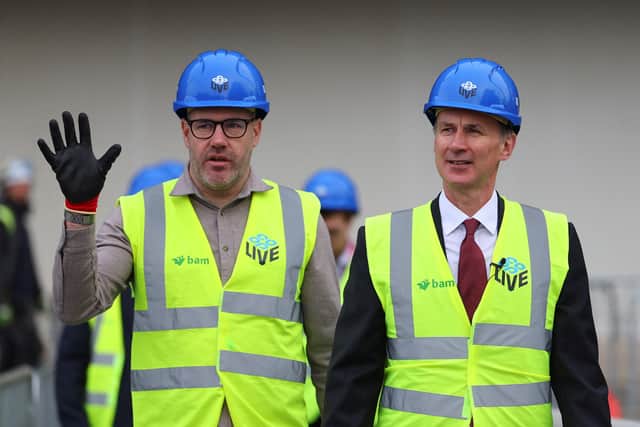Gary Roden with British Chancellor of the Exchequer Jeremy Hunt during construction of Co-op Live
