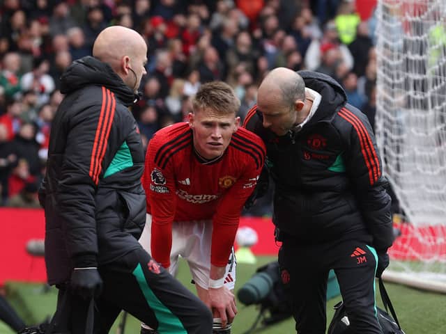 Scott McTominay leaves the pitch with an injury during the Premier League match between Manchester United and Burnley