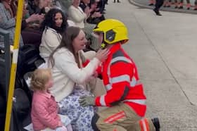 Newly qualified firefighter James proposing to his girlfriend. 
