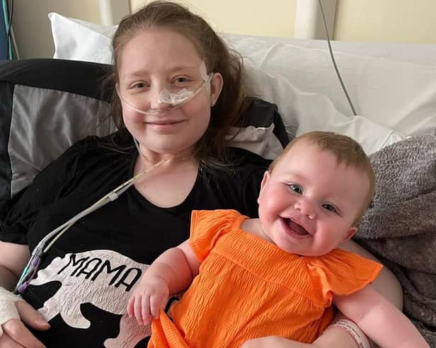 Kelsie McHugh, 30, with little one Renae whilst in hospital during treatment