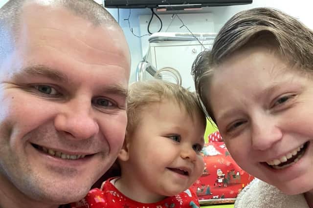Kelsie McHugh, 30, with husband Danny, 39, and their daughter Renae, 18 months.