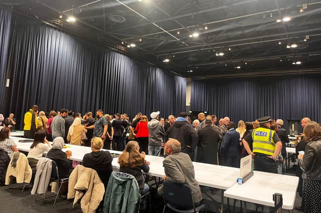 Crowds gathering near the Longsight vote count during Manchester local elections, 2024. 
