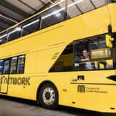 Andy Burnham inside a yellow Bee Network bus. In total, it cost £500k to turn the whole fleet of buses yellow. Credit: TfGM