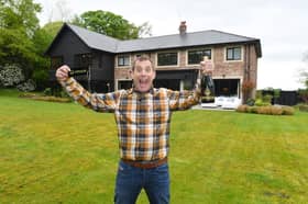 City fan Kevin Bryant outside his swanky new pad CREDIT: OMAZE / SWNS