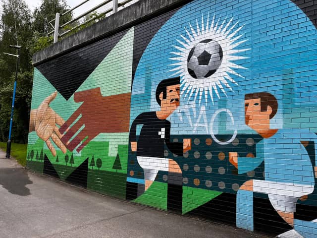 The new Stanley Chow x Akse P19 mural on the CityLink walking route between Manchester city centre and the Co-op Live. 
