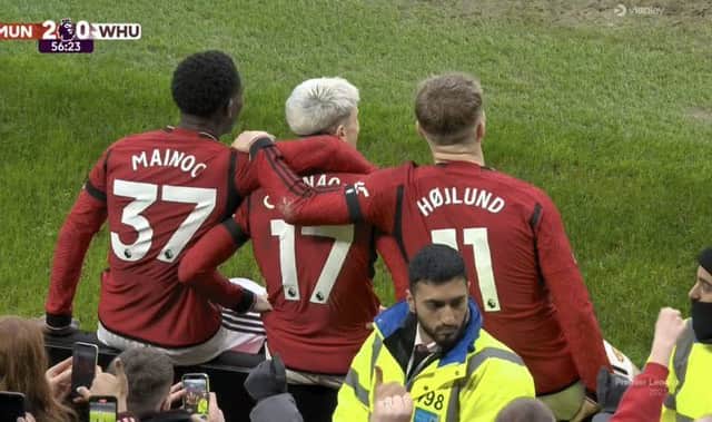Kobbie Mainoo, Alejandro Garnacho and Rasmus Hojlund celebrate against West Ham