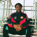 Kobbie Mainoo models an authentic anthem jacket from the 1990 FA Cup final