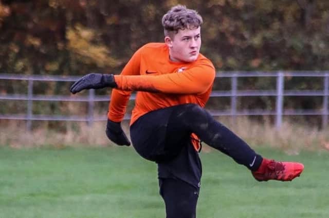 Jake Last playing football before cancer. 