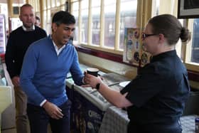 Rishi Sunak is served in the café at Bury train station