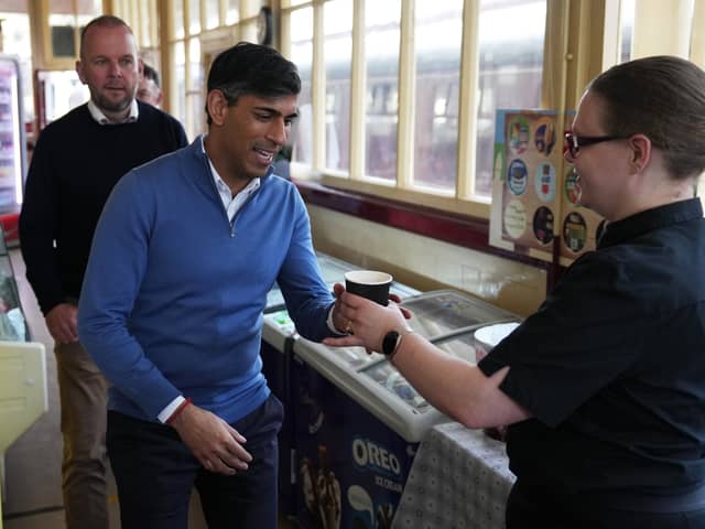Rishi Sunak is served in the café at Bury train station