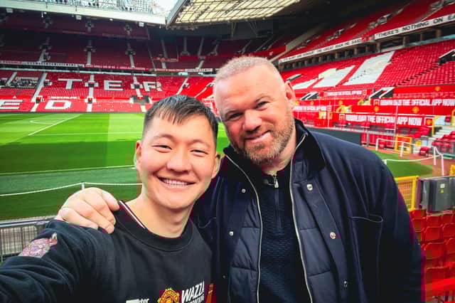 Manchester United fan Ochirvaani Batbold , 27, meets Wayne Rooney after cycling all the way to the football club's stadium from Mongolia. 