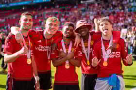 Diogo Dalot, Rasmus Hojlund, Amad, Kobbie Mainoo and Alejandro Garnacho celebrate winning the FA Cup