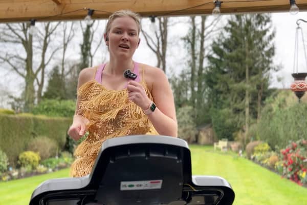 Rebecca Richmond-Smith singing the entire 46-song setlist while running on a treadmill.
