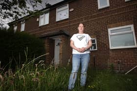 Katie Collins at her house in Swinton, where she lives with her three kids, one of whom has complex medical needs. She has been in temporary accommodation for two years and desperately needs a bigger house with the proper adaptations to look after her daughter.  Credit: Manchester Evening News