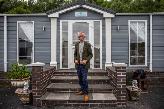 Thomas Ward, 60, pictured at Crompton Lodge in Moses Gate, Bolton, in front of his home and has lived on there for years doesn't want to leave. 