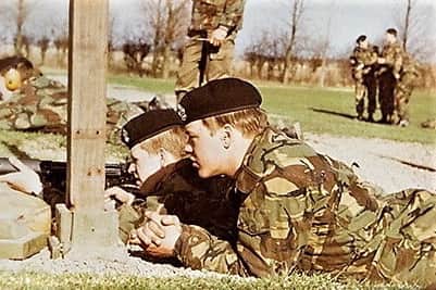 Stephen Close, right, firing a gun at a firing range in East Berlin in December 1982. 