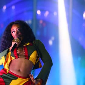 Grammy-award-winner SZA is set to close out the Pyramid Stage on Sunday as Glastonbury Festival 2024 draws to a close (Credit: Getty Images)