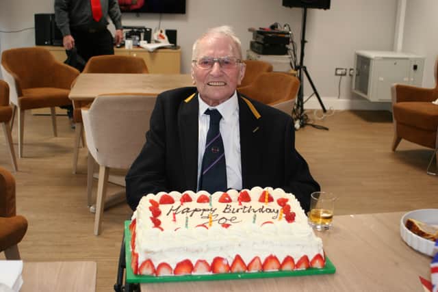 Joe Jervis with his cake as he celebrates his 101st birthday