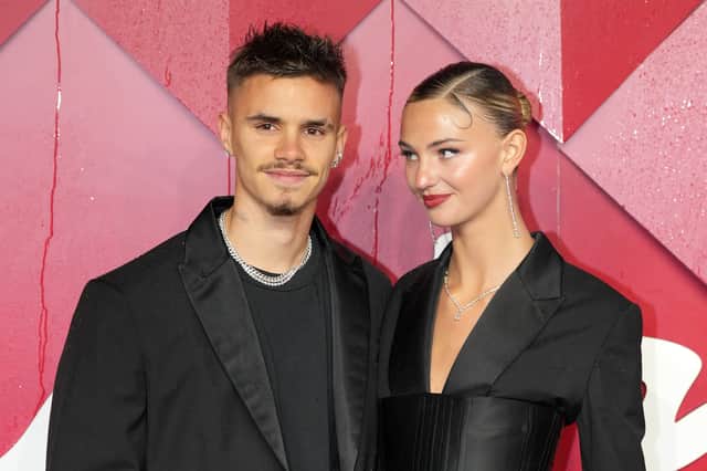 Romeo Beckham and Mia Regan attend The Fashion Awards 2023