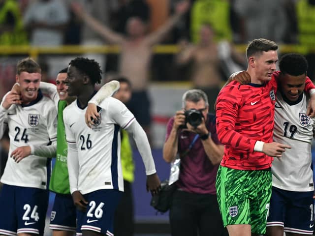 Cole Palmer, Phil Foden and Kobbie Mainoo celebrate England’s semi-final win.