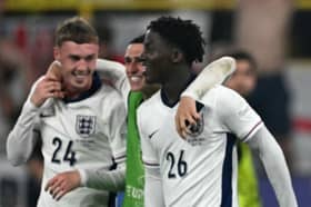 Cole Palmer, Phil Foden and Kobbie Mainoo celebrate England’s semi-final win.