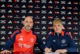 Erik ten Hag poses with Toby Collyer as he signs his new Manchester United deal