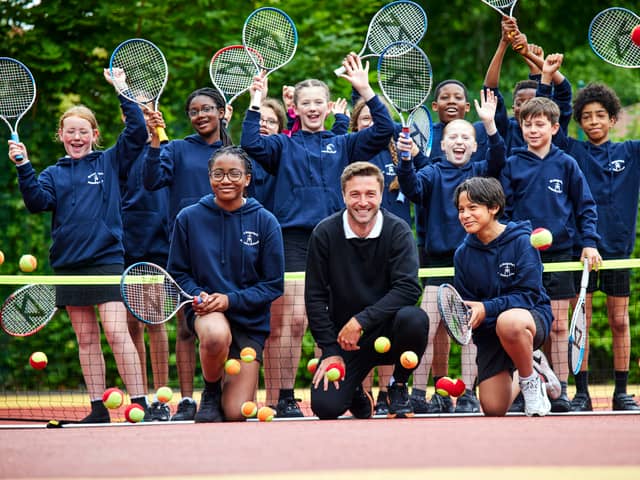 Professional tennis player Liam Broady from Stockport visits St Malachy's RC Primary School in north Manchester ahead of the Davis Cup to return to AO Arena.