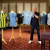 Manchester City fan Mark McCarthy with his