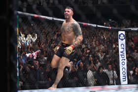 Tom Aspinall celebrates his knockout win against Curtis Blaydes